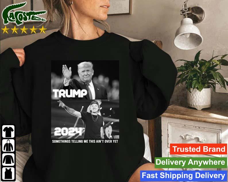 Original Something's Telling Me This Ain't Over Yet Trump Wallen 2024 Long Sleeves T Shirt